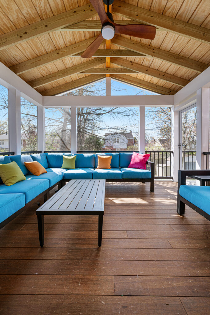 screened porch with wood floor